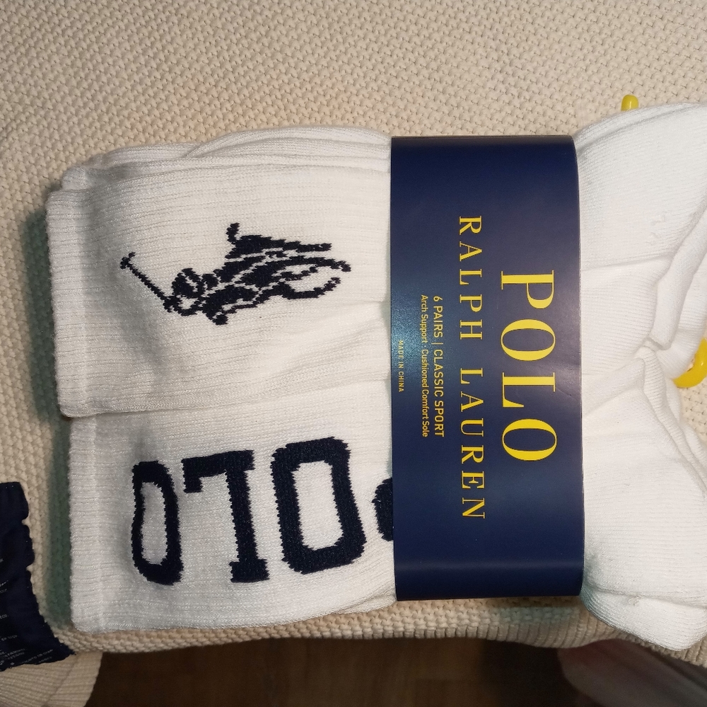 Polo Ralph Lauren sock polo spell out in 3 and pony on the others.